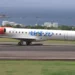 LIAT Antigua-Kingston route aircraft preparing for takeoff in St. Kitts, enhancing Caribbean travel connectivity.