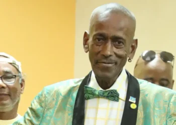 Lincoln Skinny Maynard passes away A cherished photo of Skinny at a United Workers Party event, remembered for his loyalty and dedication.