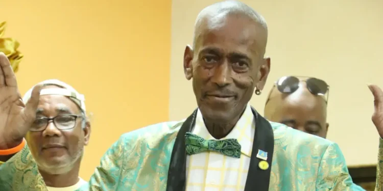 Lincoln Skinny Maynard passes away A cherished photo of Skinny at a United Workers Party event, remembered for his loyalty and dedication.