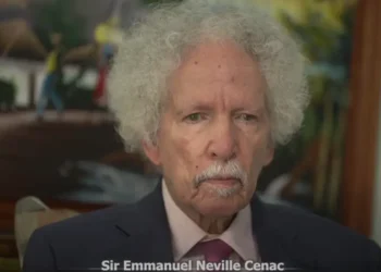 Sir Neville Cenac in a formal setting, reflecting Neville Cenac political legacy and his impact on St Lucia's political history.