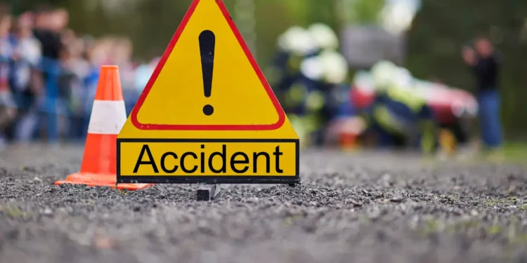 Stock image depicting emergency response at the scene of a Bois Dorange accident, with an accident warning sign in focus.