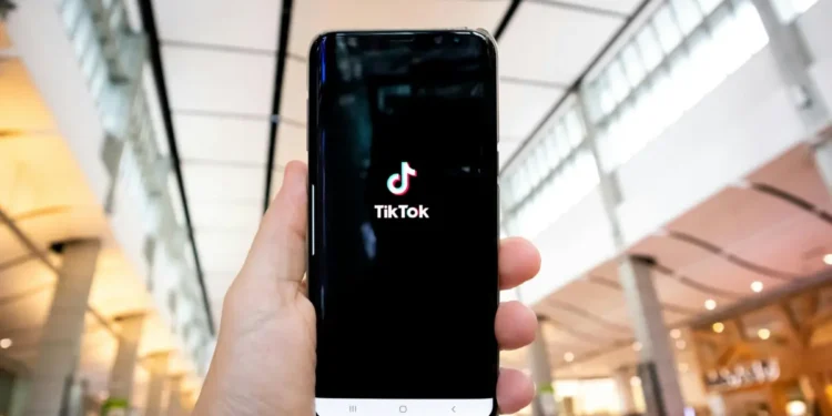A smartphone displaying the TikTok logo, representing Biden deferring TikTok decision amid national security debates.