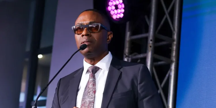 FICS Chairman Lorne Theophilus speaking at an event, emphasizing the FICS ECCB appointment and the institution's future direction.