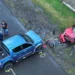 Fatal Gros Islet Highway collision showing a damaged red Suzuki Swift and blue Mitsubishi Sportero as investigators examine the scene.