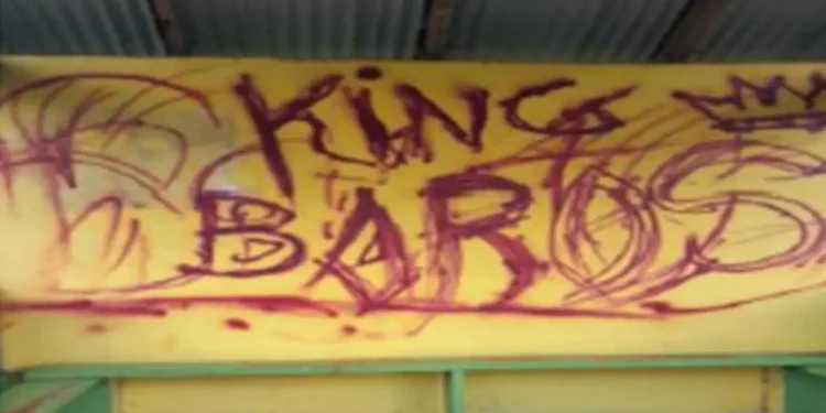 Graffiti reading King Baros defacing a bus shelter in Belle Vue, highlighting the Belle Vue vandalism incident addressed by the RSLPF crackdown.