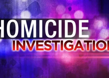 Graphic displaying 'Homicide Investigation' with vibrant lights, highlighting the Soufriere homicide under investigation in Saint Lucia.
