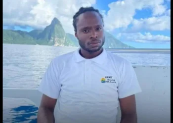 Hank Monrose, victim of the tragic Soufriere shooting, pictured with the Pitons in the background.