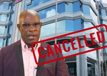 Image of Richard Frederick with a 'Cancelled' stamp overlay, referencing the Richard Frederick bank account closure controversy involving the Bank of Saint Lucia.