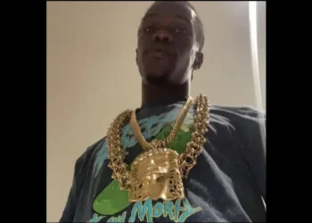 Ivin Kenal Lucien, identified as St Lucia 1st fatality 2025, wearing a gold chain and t-shirt, in a personal photograph.