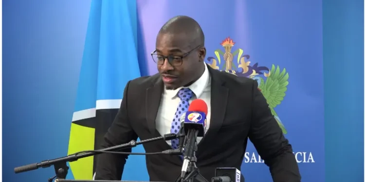 Kenson Casimir addressing rapid wealth accumulation controversy at a pre-cabinet meeting.