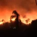 Los Angeles wildfires blaze fiercely at night, fueled by intense Santa Ana winds, engulfing Pacific Palisades in flames and smoke