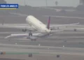 Near-miss at LAX as a Delta jet takes off narrowly avoiding a collision with the Gonzaga basketball team's plane on the runway. Photo Credit Airline Videos.