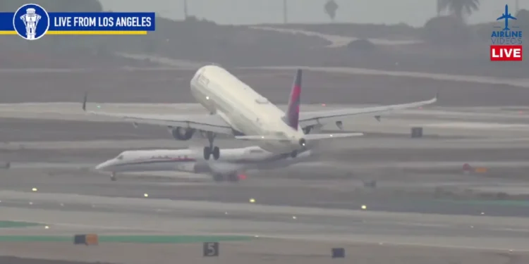 Near-miss at LAX as a Delta jet takes off narrowly avoiding a collision with the Gonzaga basketball team's plane on the runway. Photo Credit Airline Videos.