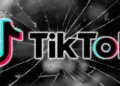 TikTok logo on a cracked screen, symbolizing TikTok Goes Dark in the U.S. amid a federal ban.