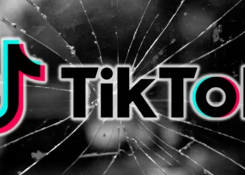 TikTok logo on a cracked screen, symbolizing TikTok Goes Dark in the U.S. amid a federal ban.