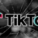 TikTok logo on a cracked screen, symbolizing TikTok Goes Dark in the U.S. amid a federal ban.