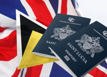 UK flag alongside Saint Lucian passports representing the new UK Electronic Travel Authorization requirement for Saint Lucians.