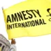 Amnesty International flag raised, highlighting constitutional concerns in Saint Lucia.