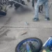 Blurred image of the Vieux Fort Bike Show disaster, where a stunt crash injured several, including a child. (Viewer discretion advised).