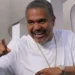 Irv Gotti dies at 54 Murder Inc. founder smiling during a public event, remembered for shaping 2000s hip-hop and R&B.
