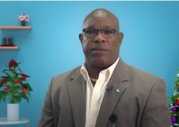 Richard Frederick delivers his Christmas message against a festive backdrop, as the haunting ghost of Richard Frederick remains a topic of public debate.