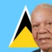 Sir John Compton independence legacy honored with his portrait against the Saint Lucia flag, symbolizing his role in the nation’s sovereignty.
