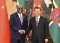 Chinese President Xi Jinping and Dominica’s PM Roosevelt Skerrit discuss a Chinese distribution center in Dominica.