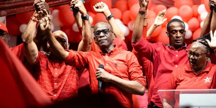 Philip J. Pierre at an Anse La Raye rally addressing supporters amid Pierre 8.8 percent St Lucia growth controversy.
