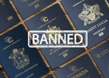 Caribbean passports with a banned stamp, highlighting Trump's crackdown on Caribbean Golden Passports after EU’s 2023 warning.