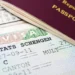 Schengen visa and passport highlighting EU visa-free travel suspension for Caribbean CBI nations