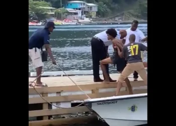 Ken Joseph Ismael suspect arrested and escorted by police at Soufriere dock