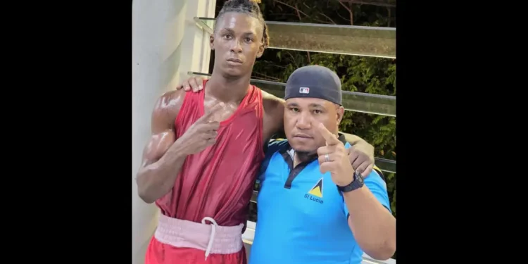 St. Lucian boxer Kyle Marcel celebrates victory with his coach after securing a spot in the 75kg boxing finals at the Caribbean Trophy Tournament.
