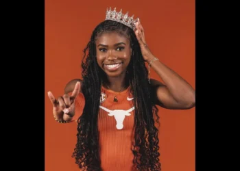 Naomi London breaks the national record, seen in this photo wearing the Longhorns uniform.