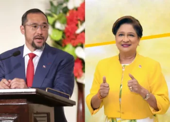 Trinidad election 2025 rivals: Prime Minister Stuart Young speaks at a podium, while opposition leader Kamla Persad-Bissessar poses confidently in yellow.