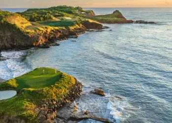 Aerial view of Point Hardy Golf Club’s dramatic cliffside green at Cabot St Lucia, ranked among Golfweek’s Top 5 international courses.