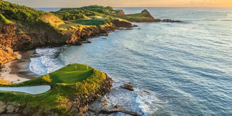Aerial view of Point Hardy Golf Club’s dramatic cliffside green at Cabot St Lucia, ranked among Golfweek’s Top 5 international courses.