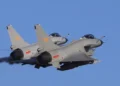 Two Chinese J-10 fighter jets fly in formation amid rising China military pressure on Taiwan