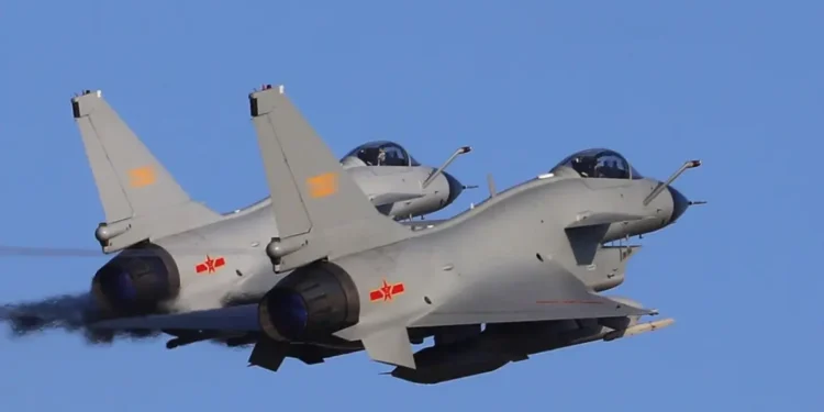 Two Chinese J-10 fighter jets fly in formation amid rising China military pressure on Taiwan