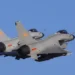 Two Chinese J-10 fighter jets fly in formation amid rising China military pressure on Taiwan