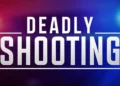 Breaking news graphic with red and blue police lights and bold white text reading “Deadly Shooting,” used to illustrate a reported fatal shooting in Jacmel, St Lucia