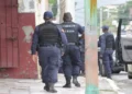 Police during Faux A Chaux police raid where 9 arrested and weapons seized in joint RSLPF operation.