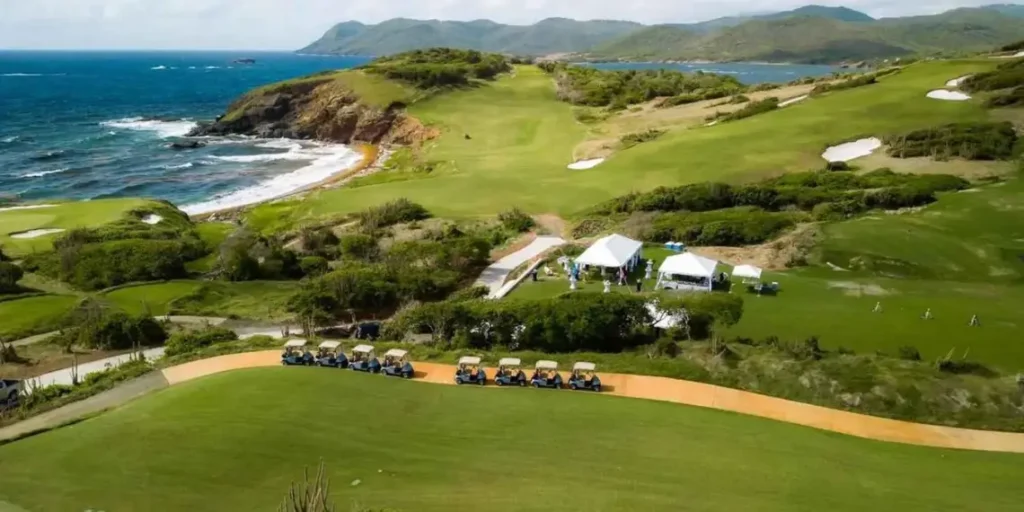Aerial view of Point Hardy Golf Club at Cabot St Lucia, showcasing dramatic coastline and lush fairways