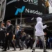 Wall Street scene outside Nasdaq as markets react to Trump tariffs recession warning
