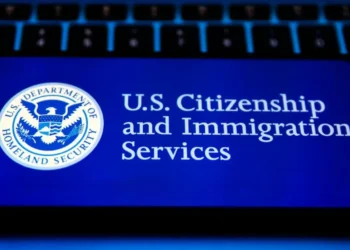 USCIS antisemitism screening policy visualized on screen under Department of Homeland Security directive