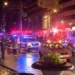 Emergency vehicles at night scene in D.C. where 2 Israeli embassy staff shot dead outside the Jewish museum; victims shown in inset.