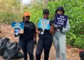 Volunteers participate in Blue Lagoon Island Earth Day cleanup on Nassau's coast