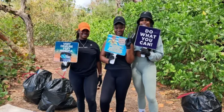 Volunteers participate in Blue Lagoon Island Earth Day cleanup on Nassau's coast