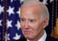Joe Biden diagnosed with prostate cancer, close-up photo with U.S. flags in background