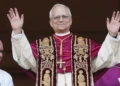 Pope Leo XIV appears on the balcony of St. Peter’s Basilica for his first blessing after being elected as the first American pope