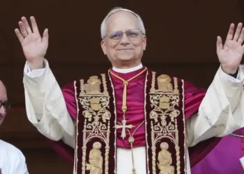 Pope Leo XIV appears on the balcony of St. Peter’s Basilica for his first blessing after being elected as the first American pope